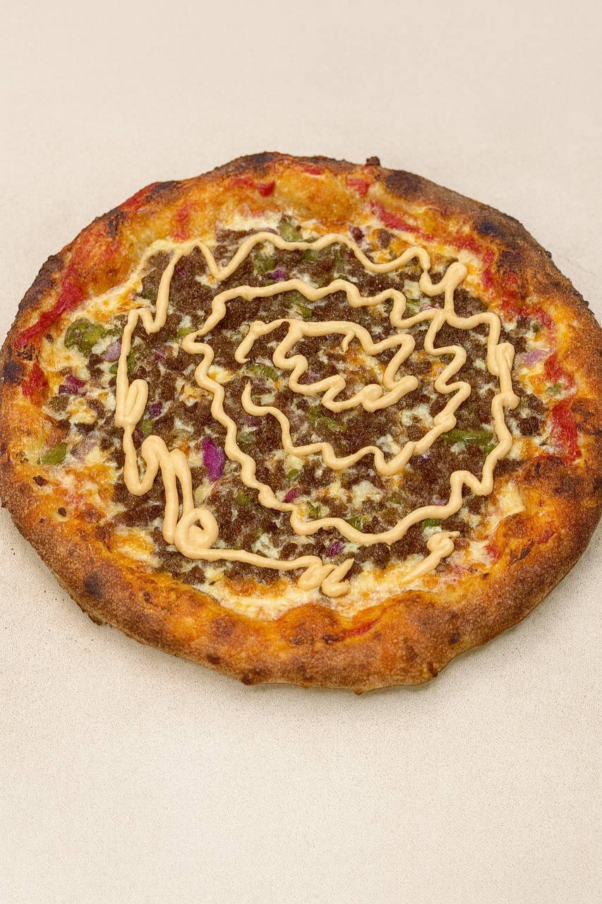 Kosher meat lovers pizza at Benny's Bagels Dallas TX